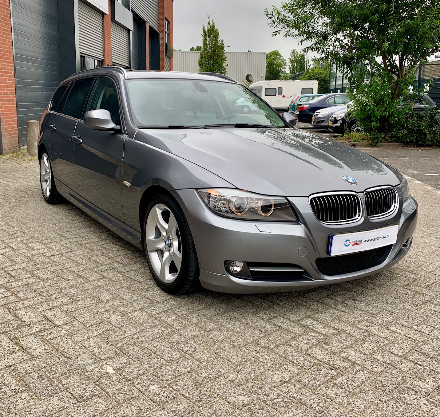 BMW 320i Touring E91 - Maart 2011 - AutoRaad